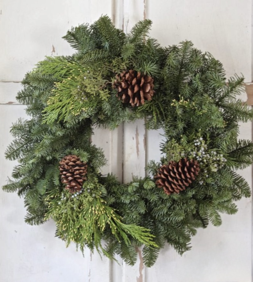 Fresh handmade wreath with pinecones